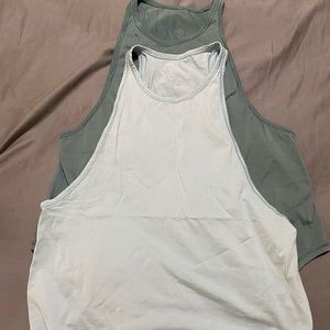 Pair of sweat date tanks